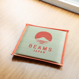 Beams Japan cushion on a wooden floor