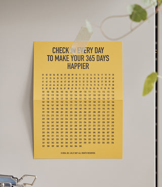 Motivational poster on a wall with text 'Check in every day to make your 365 days happier'.