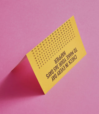 Yellow poster with text on a pink background