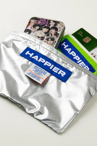 Silver pouch with 'HAPPIER' branding on a white background