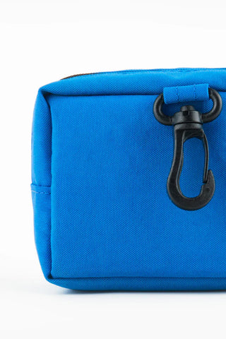 Blue pouch with a black keychain on a white background