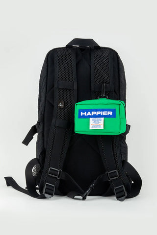 Black backpack with a green pocket featuring the 'Happier' brand on a white background