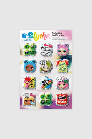 Puffy sticker sheet with colorful character faces and text, by MILKBBI