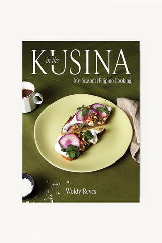Book cover of 'In the Kusina' with a dish  on a green background