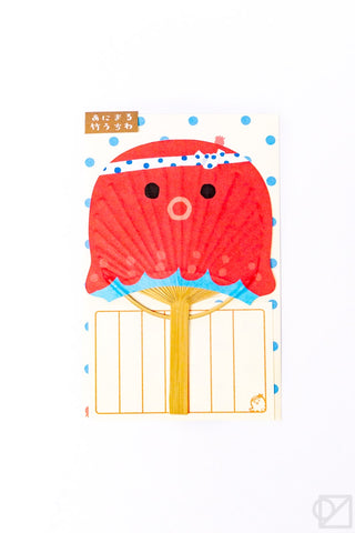 Red cartoon tako fan on a white background