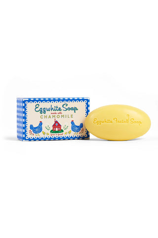 Bar of soap with blue checkered packaging on a white background