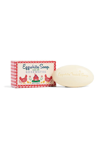 Bar of soap with a red and white checkered box on a white background