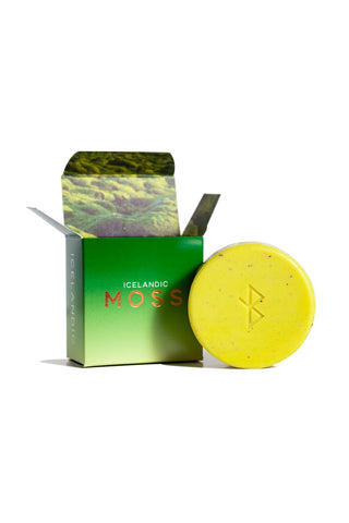 Moss soap bar in green box packaging, yellow-green bar with star imprint