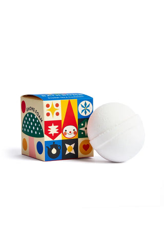 Round white foam bath bomb with gnome-themed colorful box