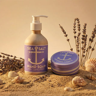 Sea Salt lavender hand soap and lavender candle with lavender flowers and shells on sand