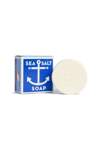 Bar of sea salt soap with packaging on a white background