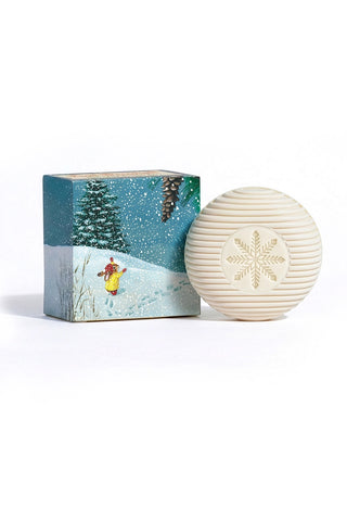 Snowflake round soap with carved snowflake pattern, beside printed gift box