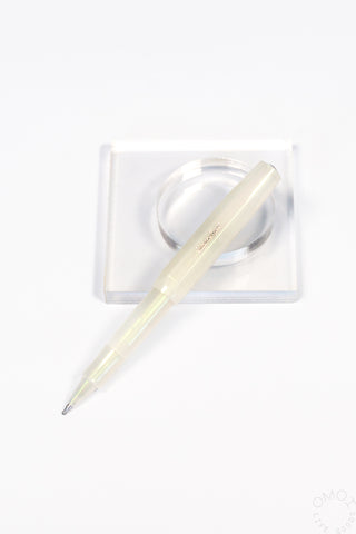 Kaweco lunar light green rollerball on a clear stand