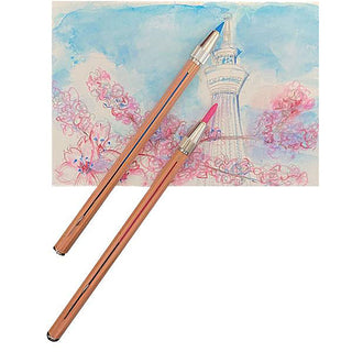 Two pencils with colored tips on a watercolor background of cherry blossoms and a tower.