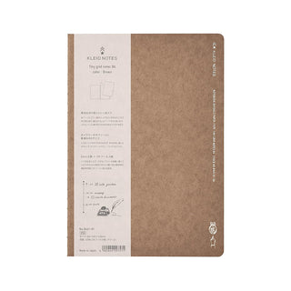 Brown B6 2mm grid notebook with back cover print and vertical spine markings