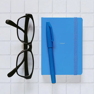 Blue log diary with elastic strap and pen, 'TODAY' on cover