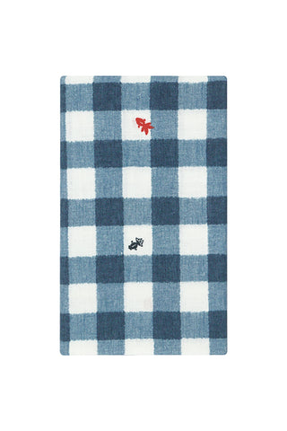 Blue and white checkered towel with goldfish designs on a white background