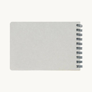 Back of small monthly calendar with spiral rings