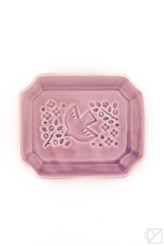 Lavender ceramic tray with decorative bird and orchid design on a white background
