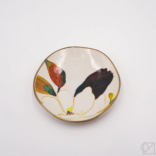 Mini floral ceramic plate, white base with gold rim and butterfly blossoms, top view