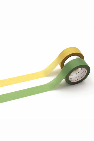 Yellow and green washi tapes made of recycled material on white background