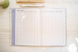 Opened planner showing year at a glance for 2027