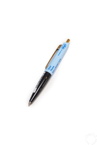 Black and blue Marks pen on a white background