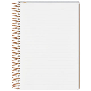 White notebook with gold spiral binding on a white background