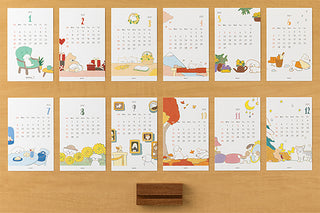 Set of 12 monthly pages for 2027 desk calendar, featuring dog and pet scenes
