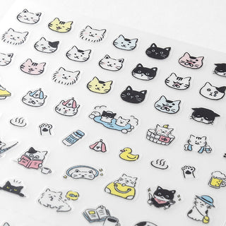 Cat-themed stickers on a white background