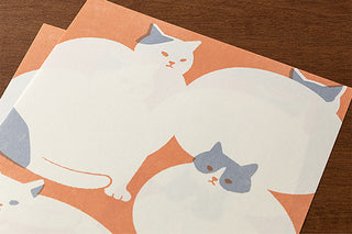 Cat paper pattern on an orange background