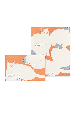 Envelope and letter pad with cat illustration on a white background