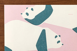 Envelope with panda illustrations on a pink background