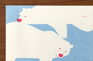 Envelopes with two white polar bears with red noses on a blue background