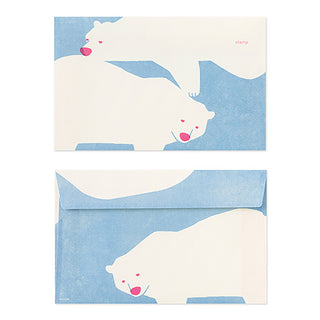Set of stationery envelopes with polar bear illustrations on a blue background