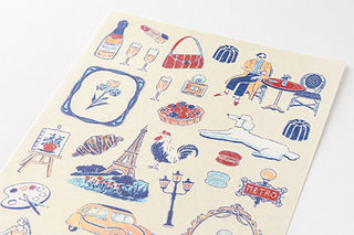 Sheet of decorative stickers with Paris-themed illustrations on a white background