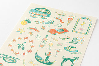 Close up of Midori Italy planner stickers with red, blue/green, yellow accents