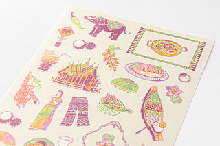 Close up of Midori Thailand planner stickers with purple, green, orange color scheme
