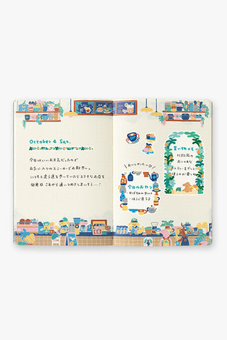 Open B6 notebook showing printed text and illustrated scenes on both pages