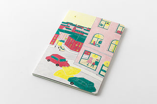 B6 notebook with illustrated city street cover featuring cars and buildings