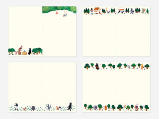 Pages from notebook with animals and nature elements on a white background