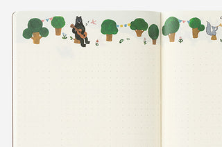 Illustrated notebook page with a bear playing guitar among trees and flowers.