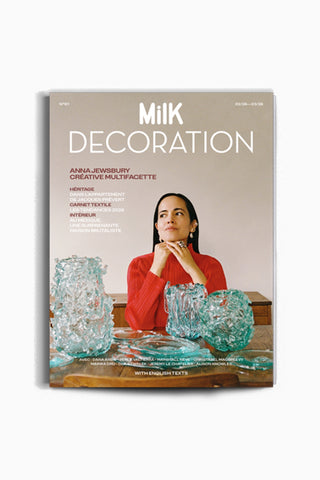 Magazine cover titled 'Milk Decoration' featuring a woman with crystal-like objects.