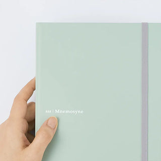 Mint A5 hard cover dot grid notebook front cover with logo on elastic band