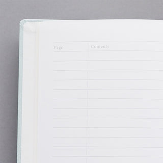 Dot grid notebook page with faint “Page” and “Contents” boxes