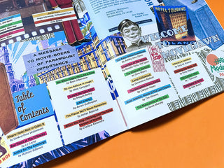 Open magazine spread with colorful layout and blocks of printed text