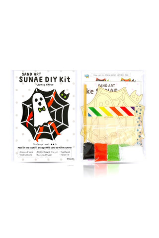 Sand art DIY kit with clumsy ghost design and colored sand sheets in package