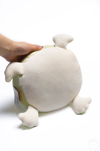 Bottom of Frog plush on a white background