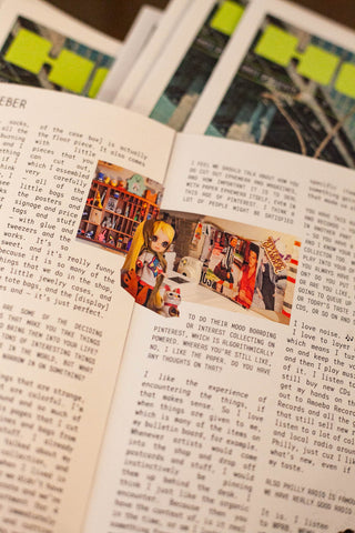 Open magazine spread with small photo and highlighted paragraphs on both pages