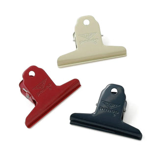 Assorted PENCO Clampy binder clips: ivory, red, and dark blue steel clips